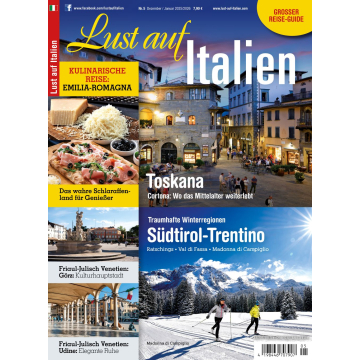 Titelblatt der Zeitschrift 'Lust auf Italien' mit Fotos von toskanischem Dorf, winterlicher Berglandschaft in Südtirol-Trentino und kulinarischen Spezialitäten aus Emilia-Romagna.
